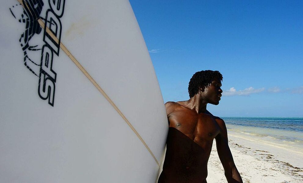 Surfen am Strand von Xanadu Villas and Retreat 