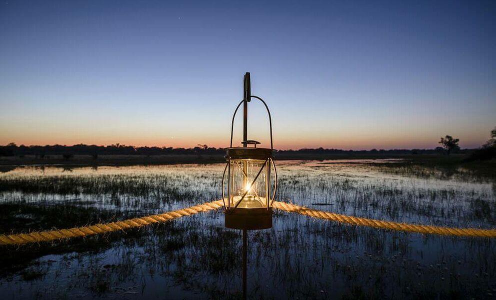 Abendstimmung vom Camp aus mit Blick auf die Flutebenen des Okavango Deltas